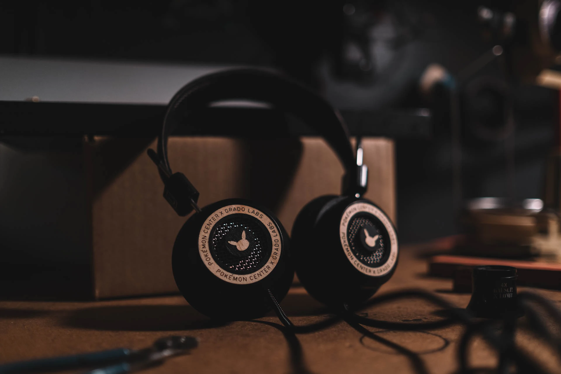 Grado Labs Pokémon metal headphones on the workbench