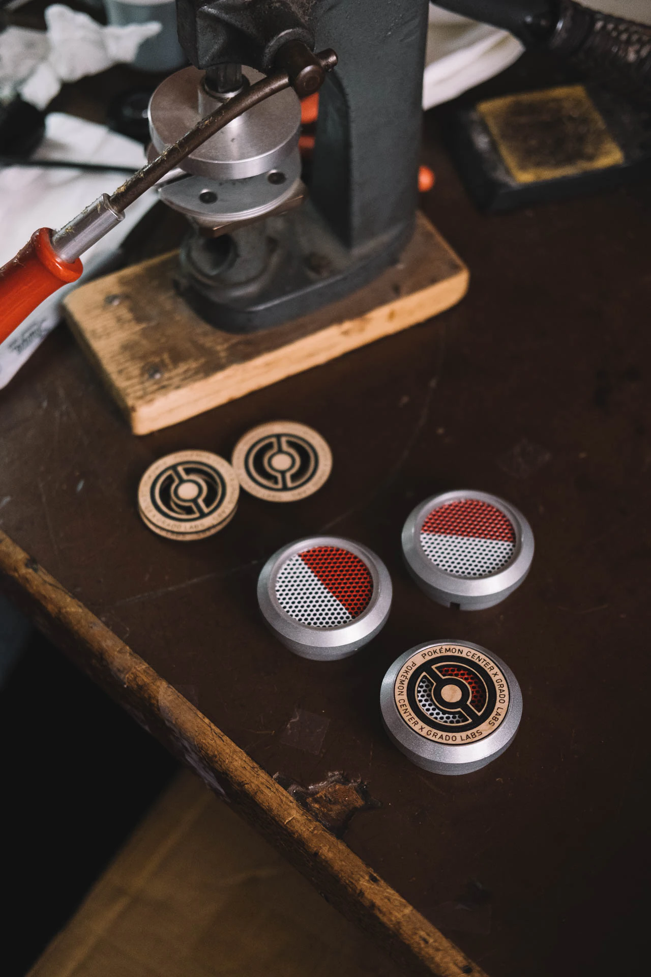 Grado Labs Pokémon metal headphones on the workbench