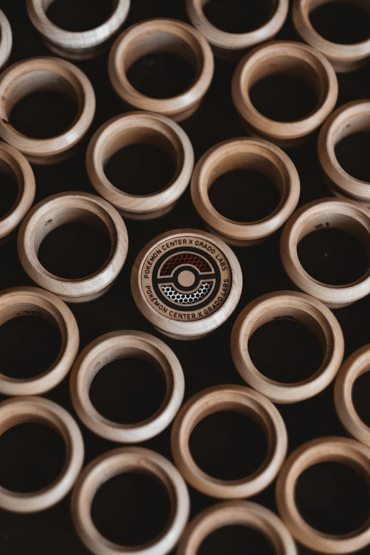 Grado Labs Pokémon wooden headphones on the workbench