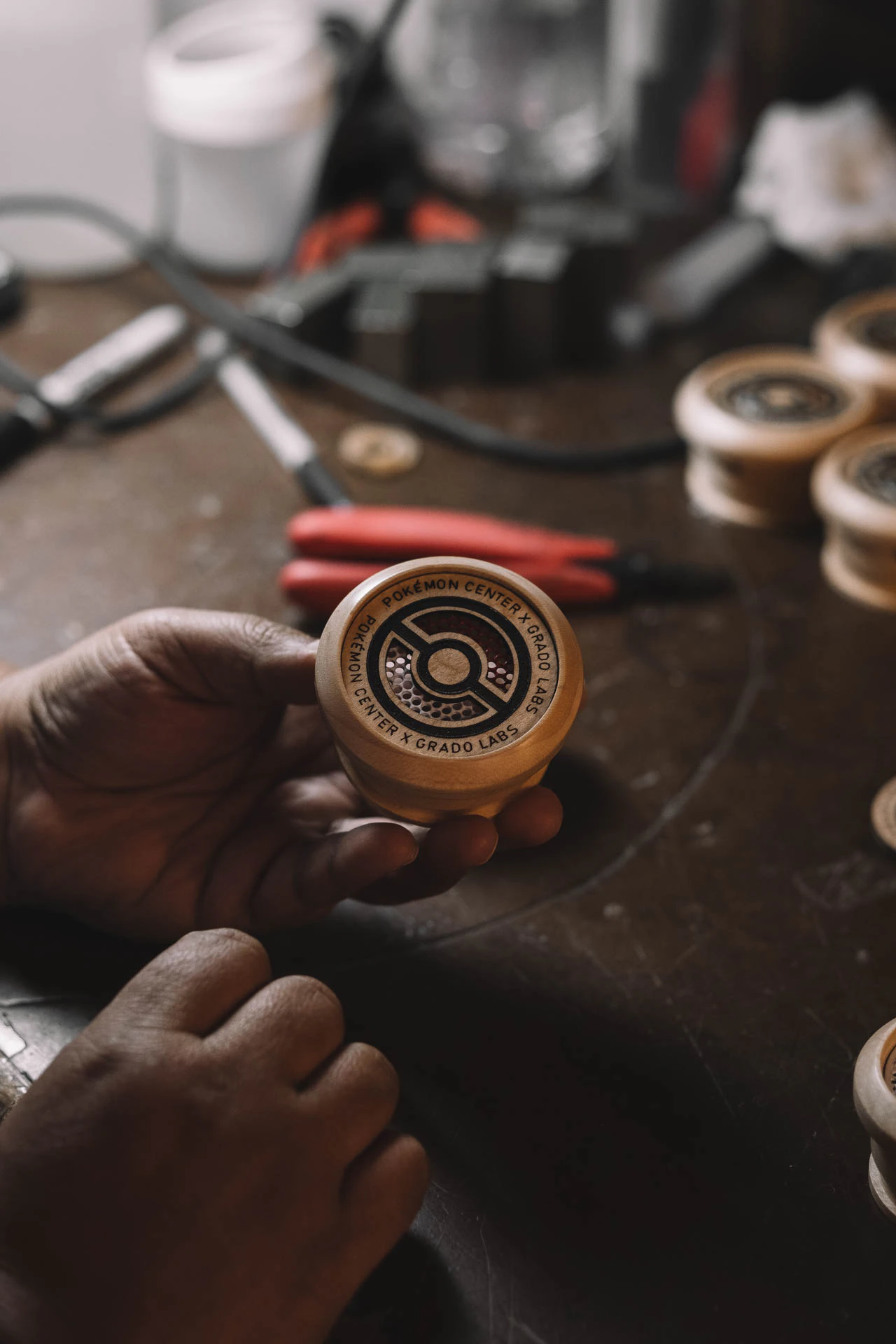 Grado Labs Pokémon wooden headphones on the workbench