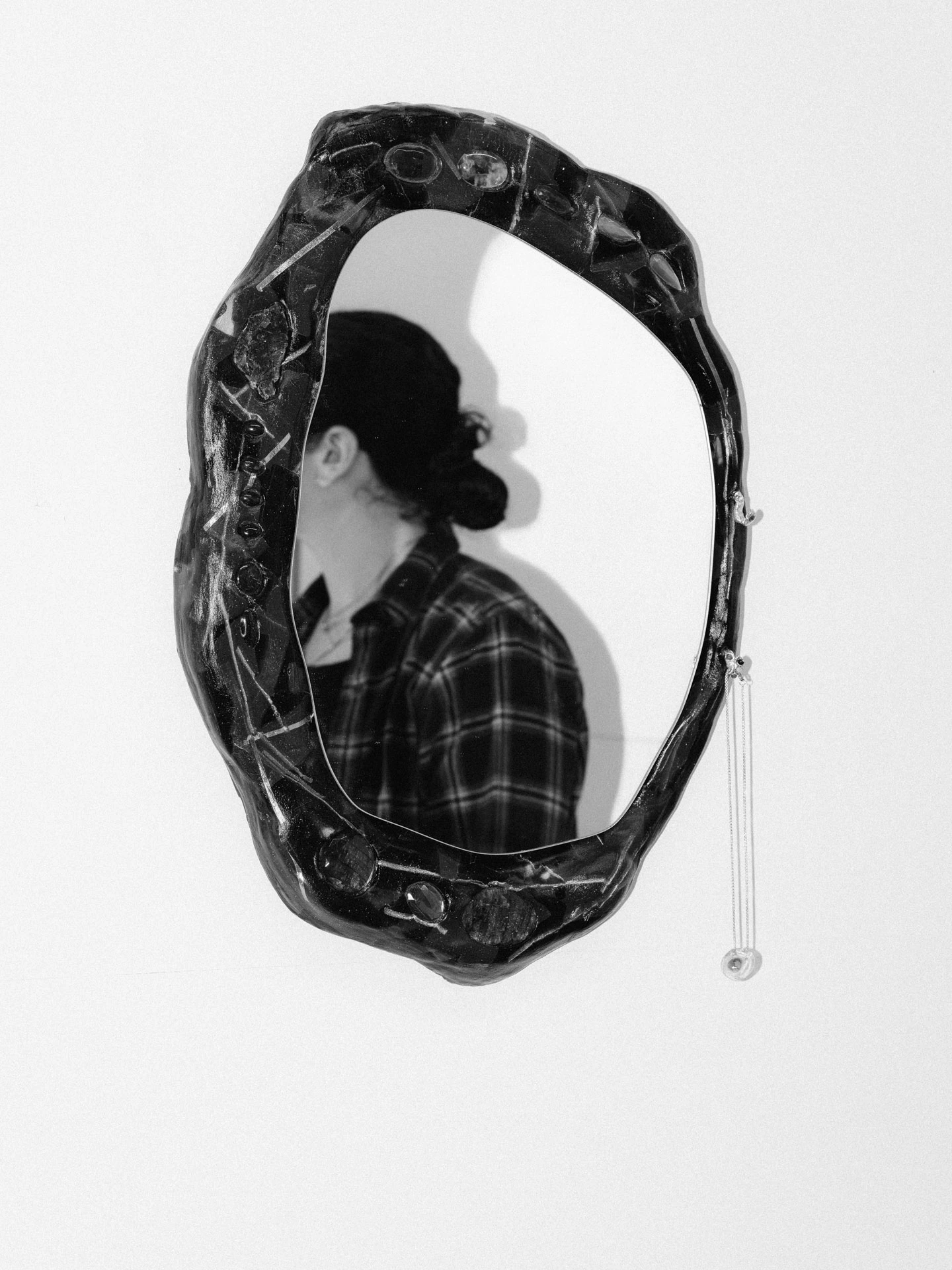 Lara Saget in mirror reflection in studio