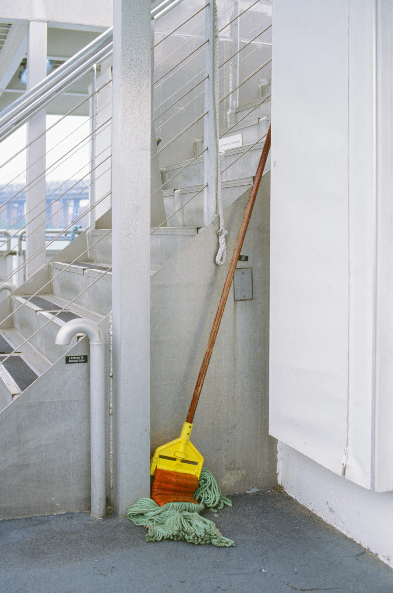 a colorful mop on the New York ferry on ektachrome 100 film