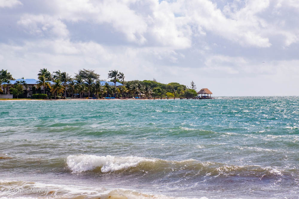View of the turquoise Caribbean waters with the Chabil Mar Resort in the distance.