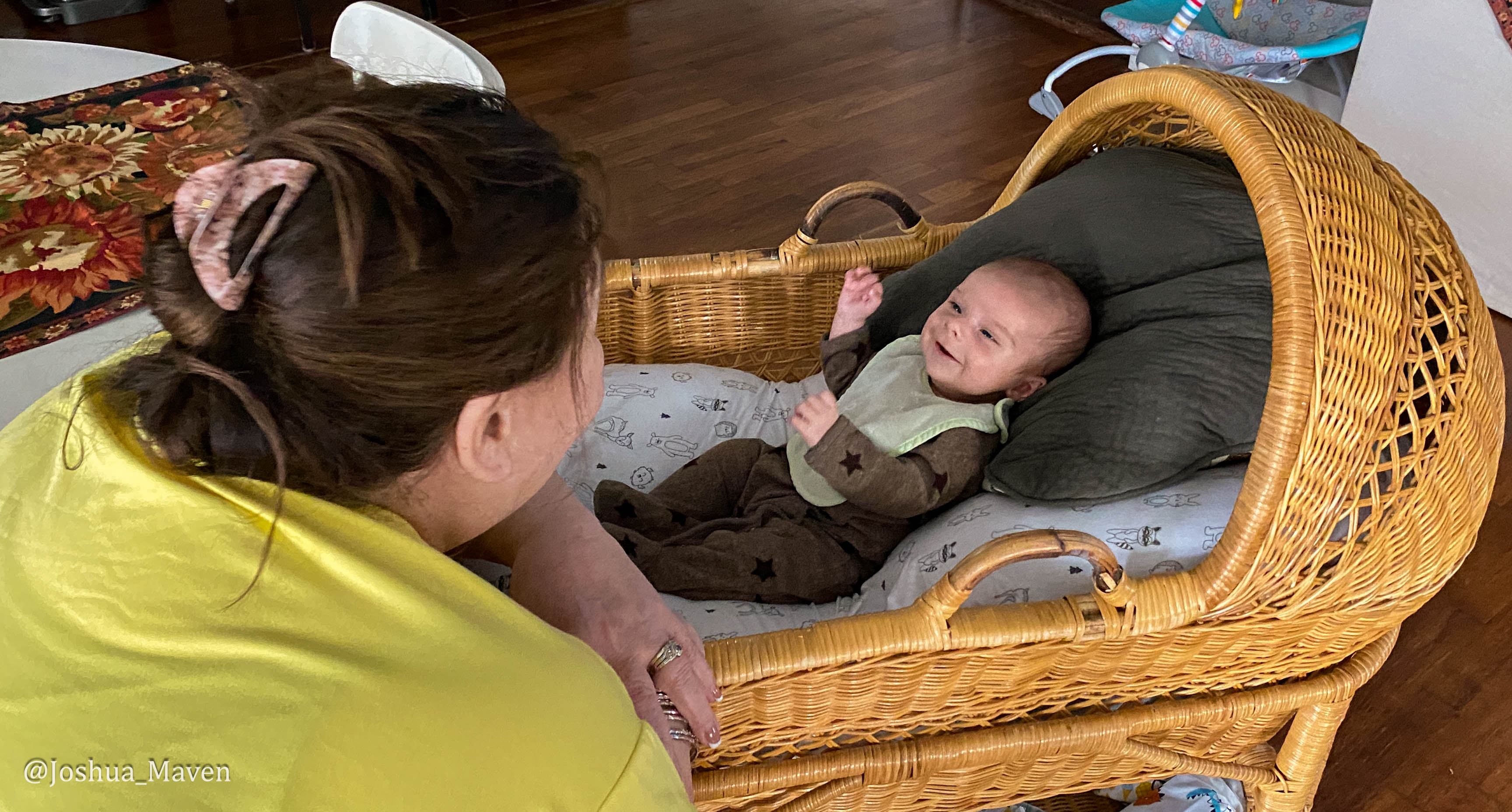 My mother spending time with my two-month-old son, Samuel, over the Thanksgiving holiday in 2023.
