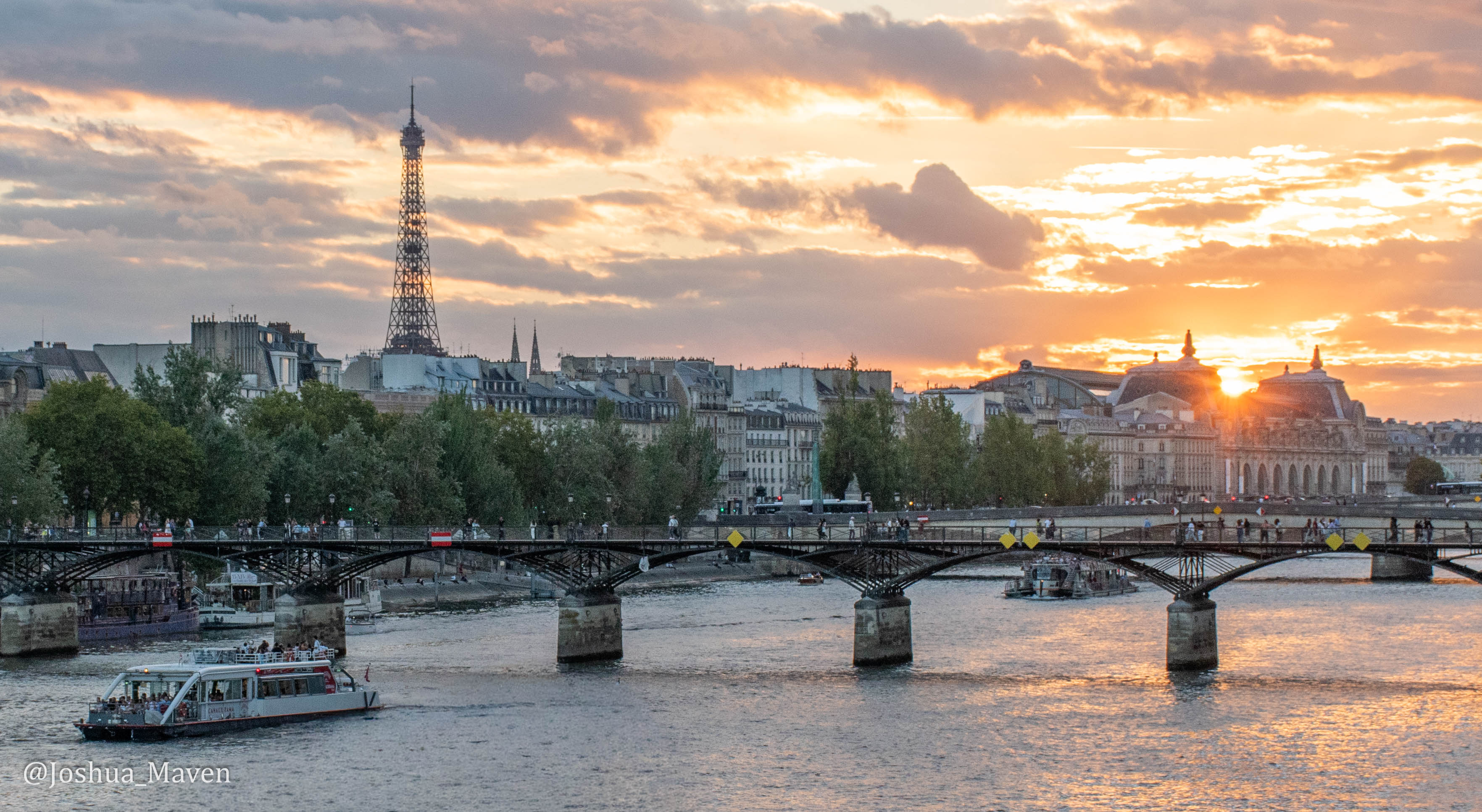 A shot of the Eiffel Tower at sunset.