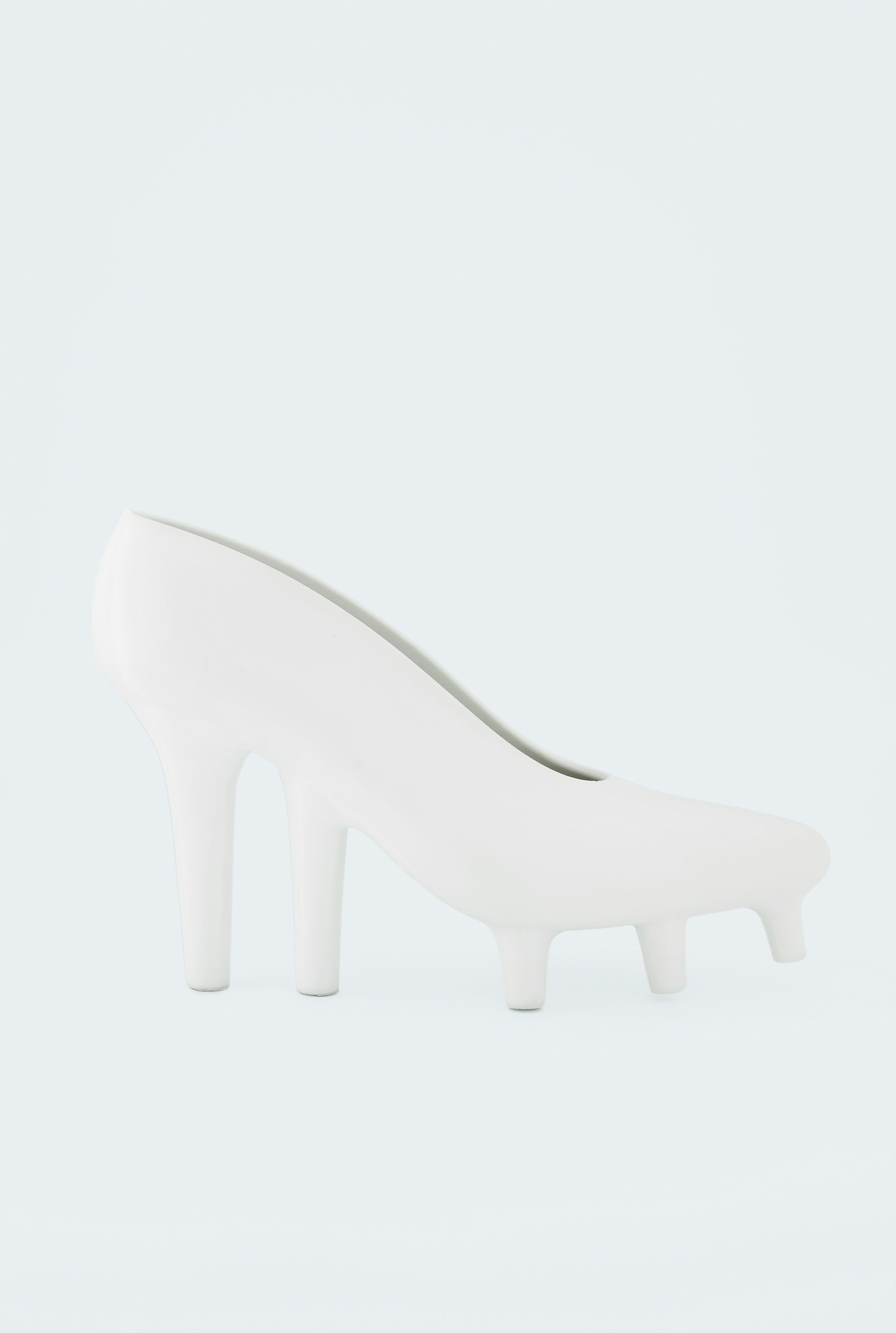The white Mille-pattes Pumps
