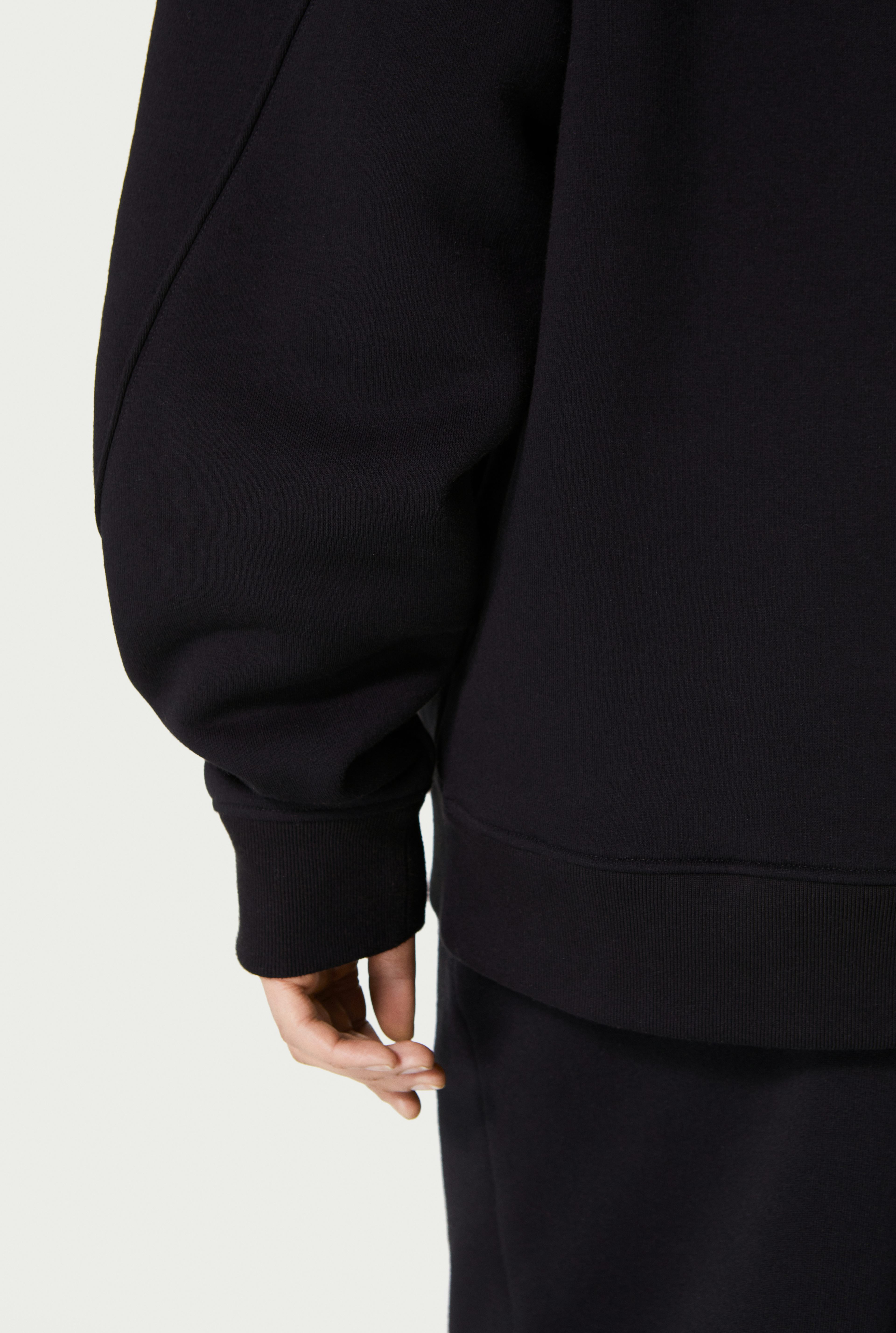 The Black Hooded Évidemment Sweatshirt Jean Paul Gaultier