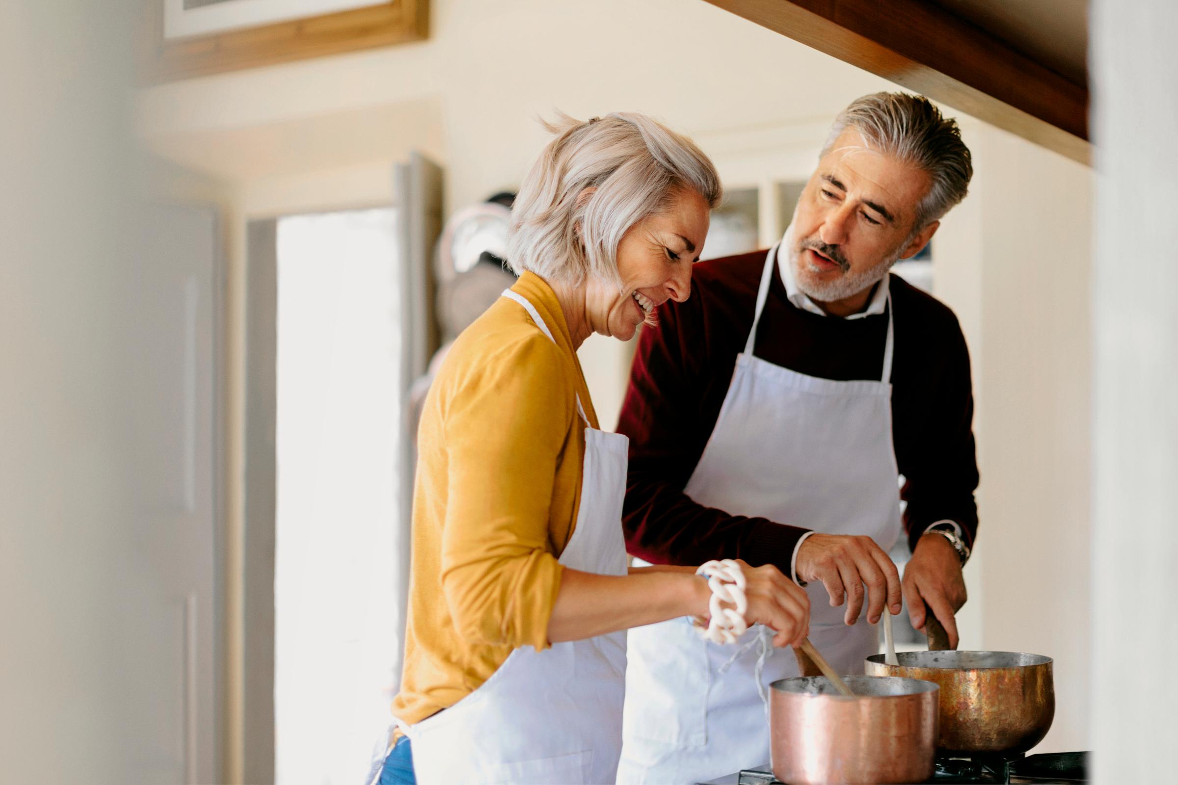 Older couple cooking