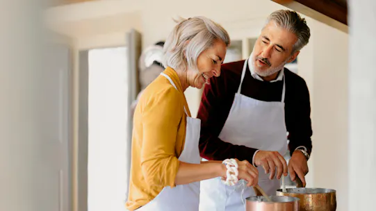 Older couple cooking