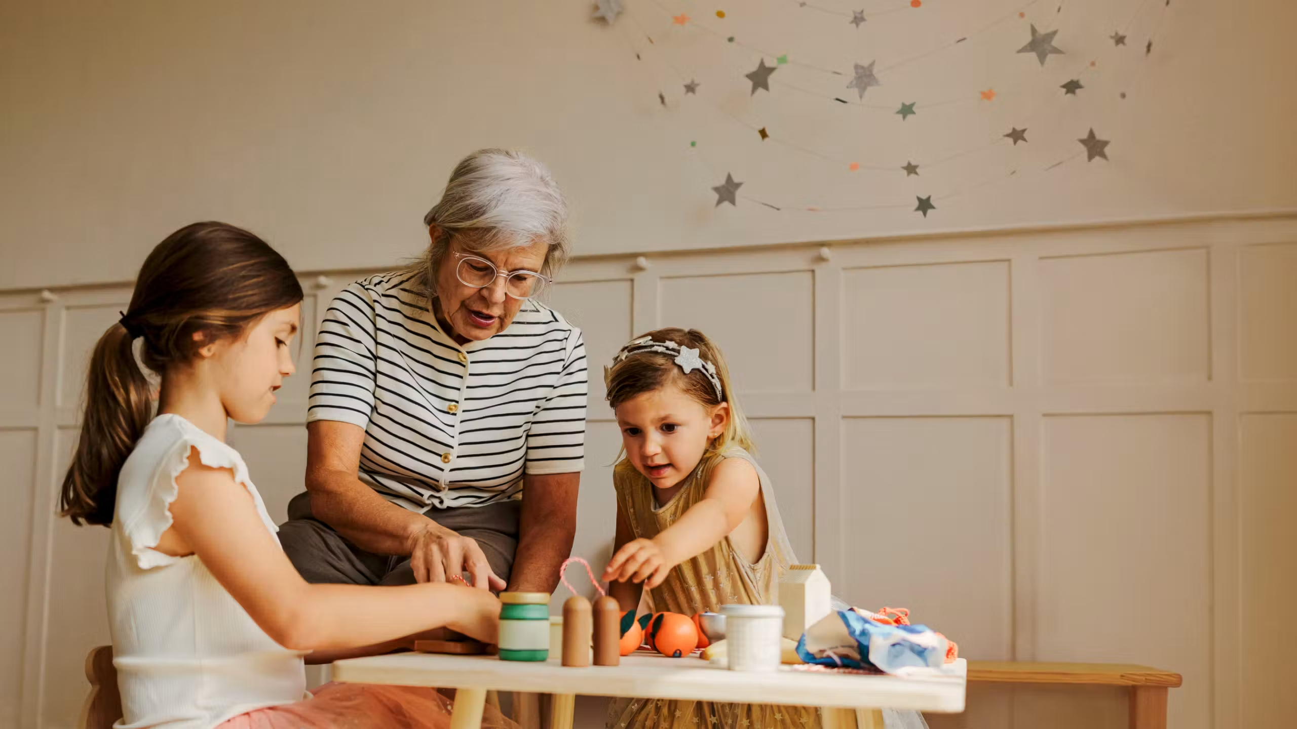 Children playing with their grandma