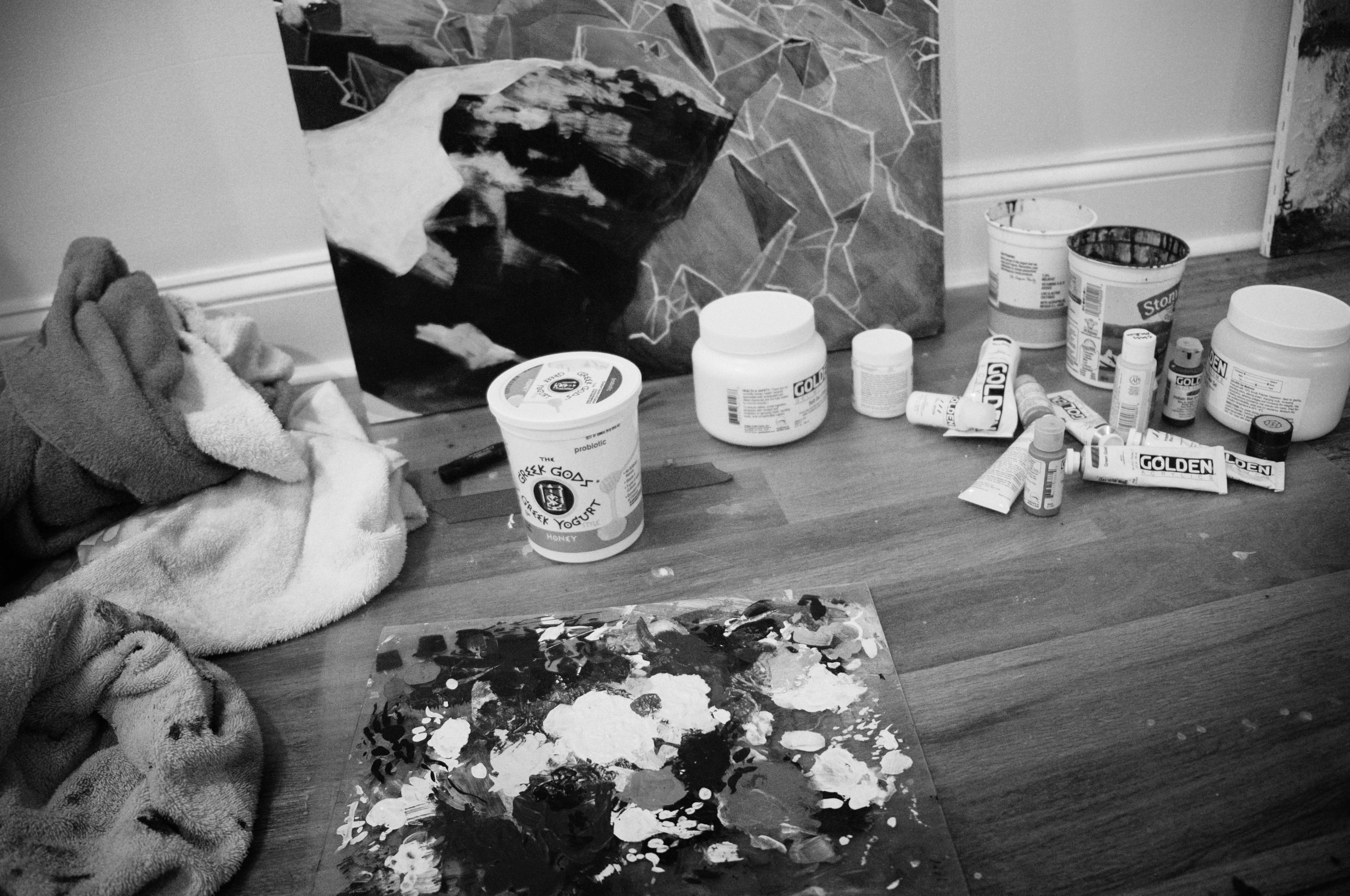My studio, with Frozen Waterfall in the background leaning against the wall, and paint cans strewn on the floor.