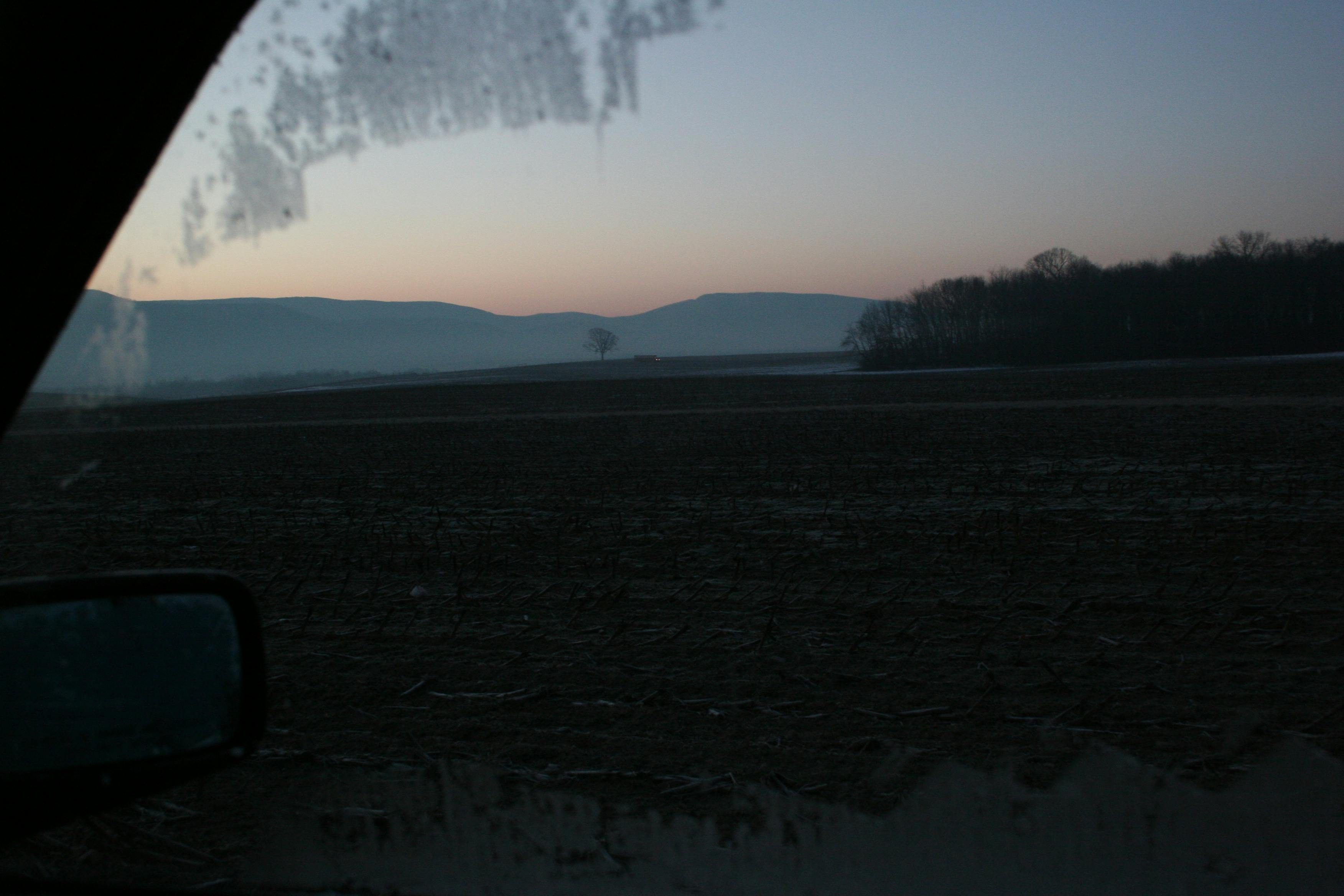 Mountains, through a frosty car window