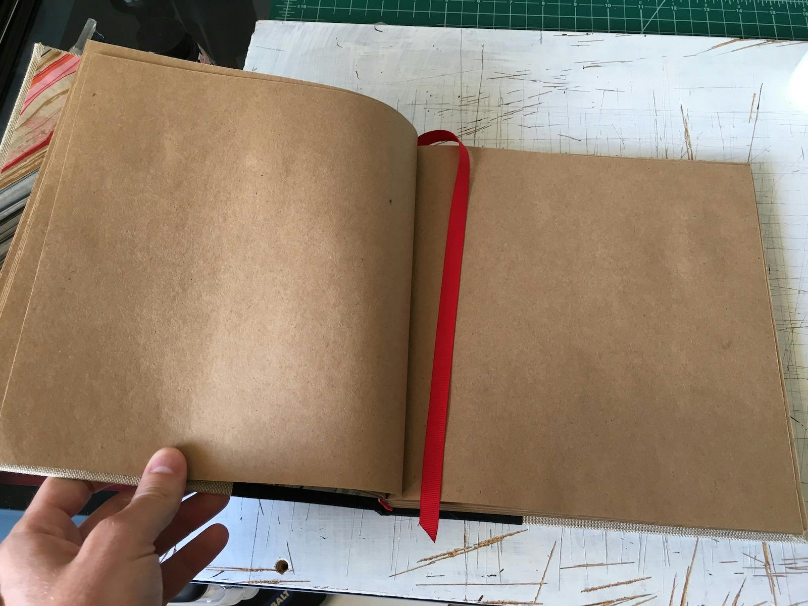 The finished sketchbook, open.