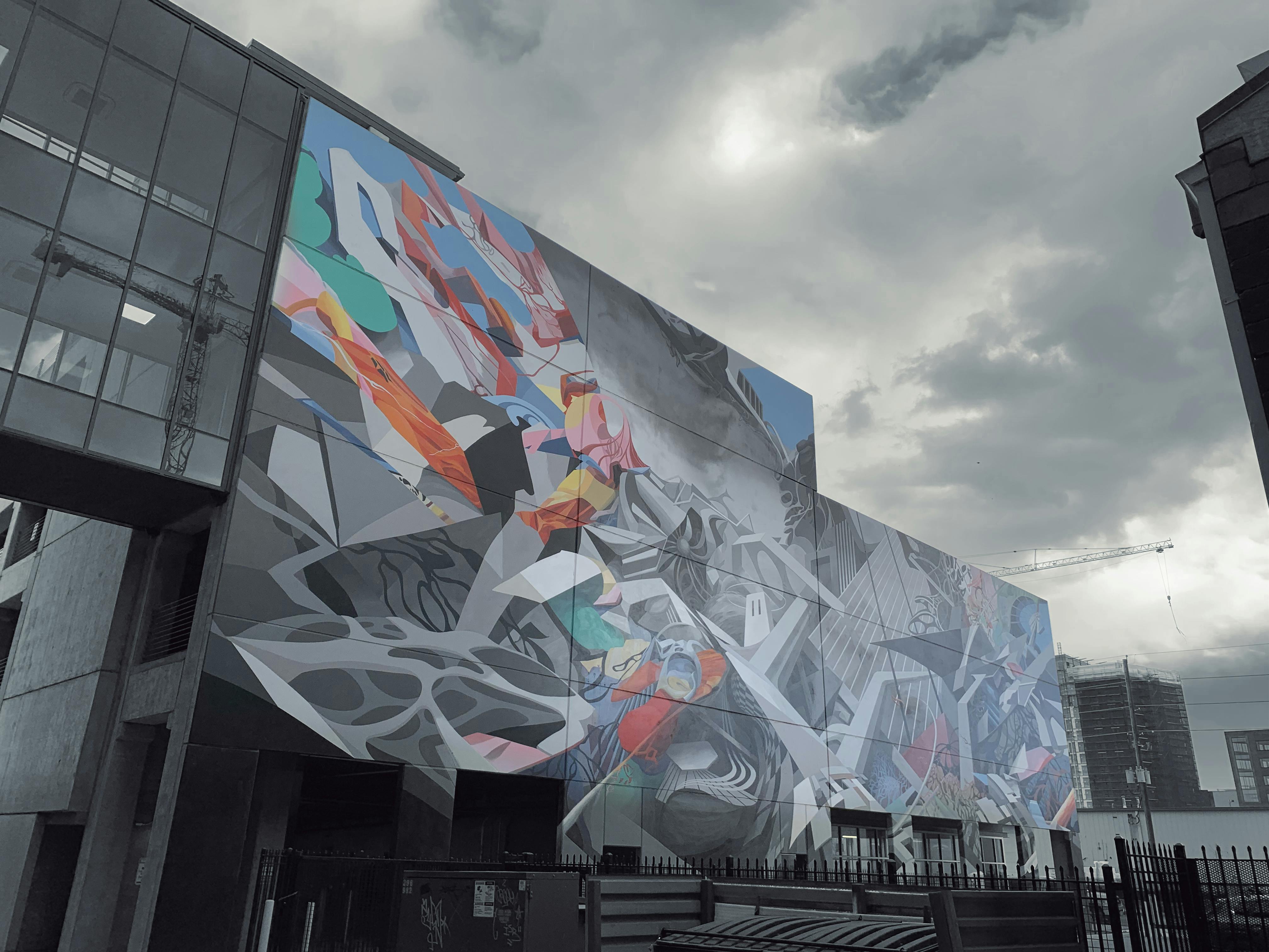 Photo of a mural on the side of a building in Denver's RiNo neighborhood