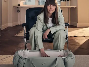 Woman with baby basket