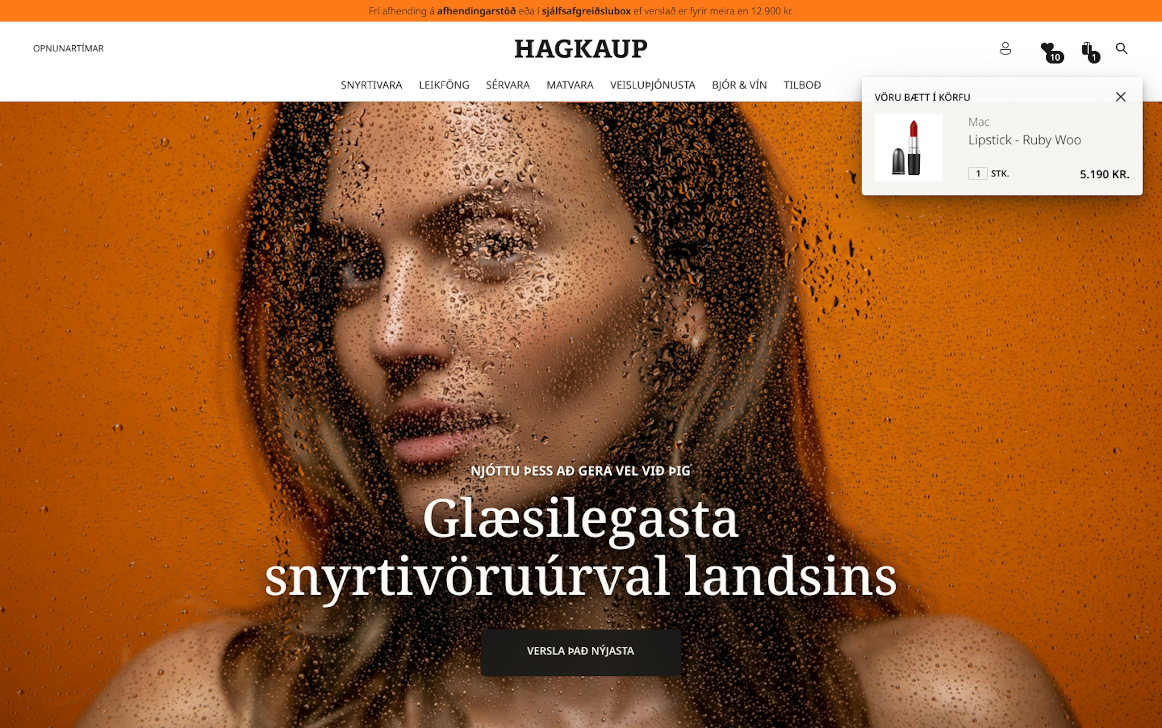 Forsíða snyrtivörudeildar á vef Hagkaups með mynd af konu á appelsínugulum bakgrunni og textanum „Glæsilegasta snyrtivöruúrval landsins“.