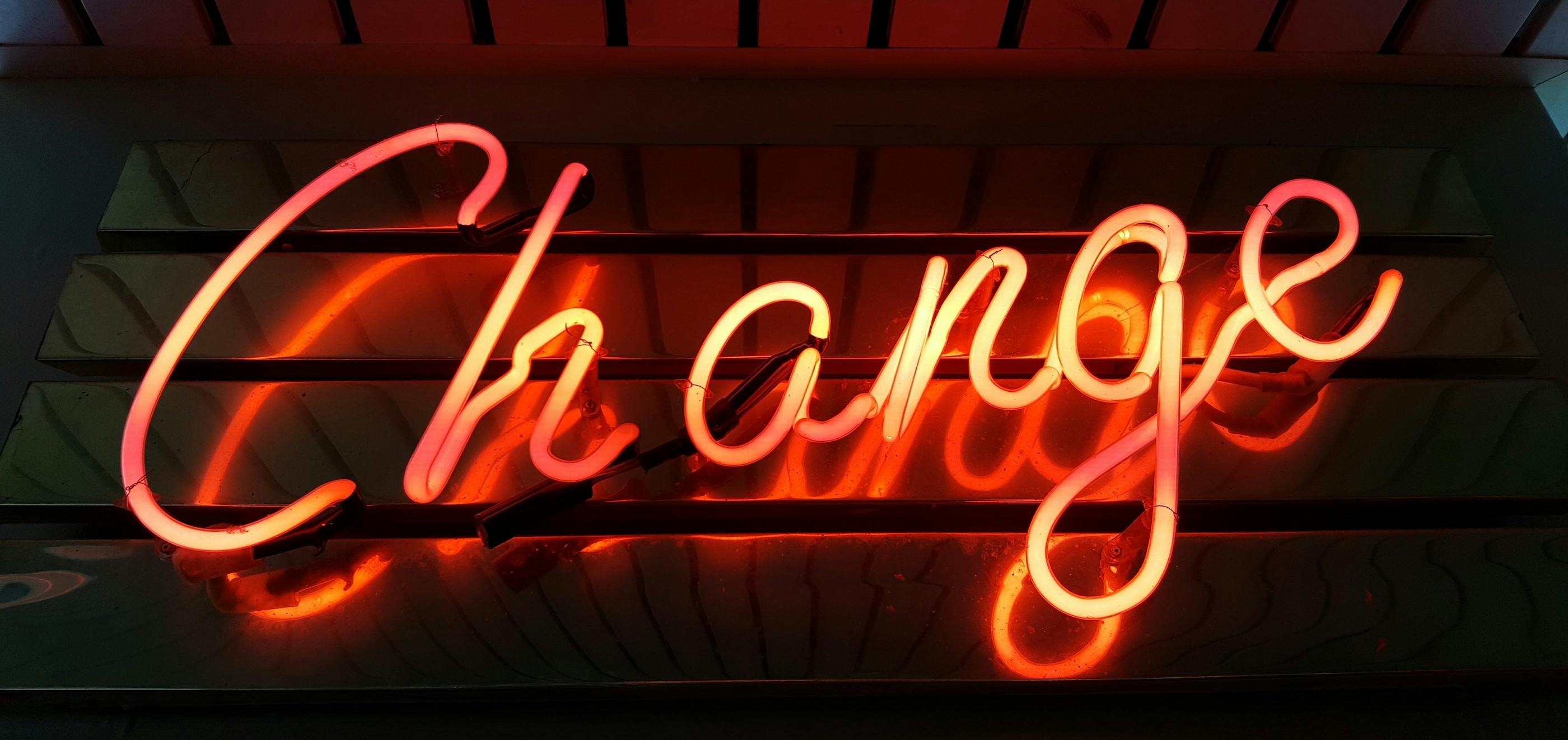 Neon sign displaying the words 'Change'