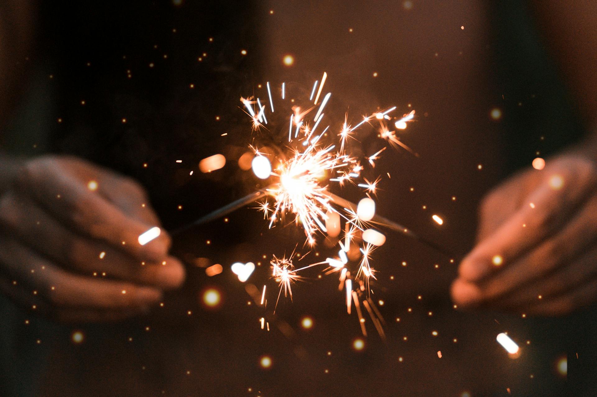Person holding Sparklers