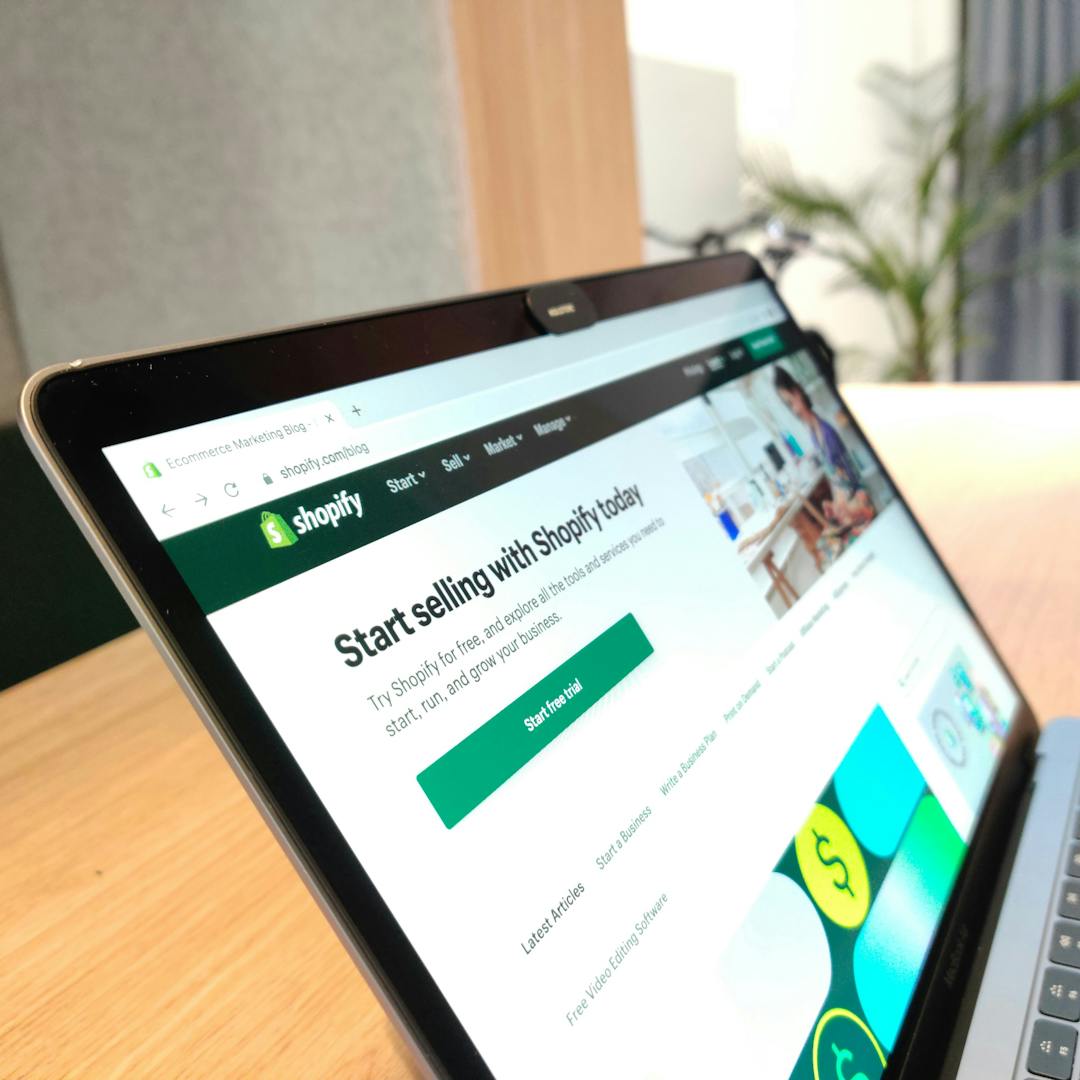 Shopify homepage on laptop screen