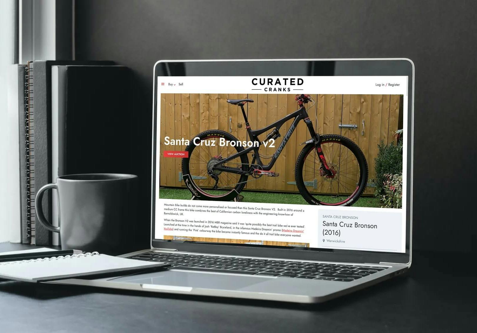 Curated Cranks Website on a laptop