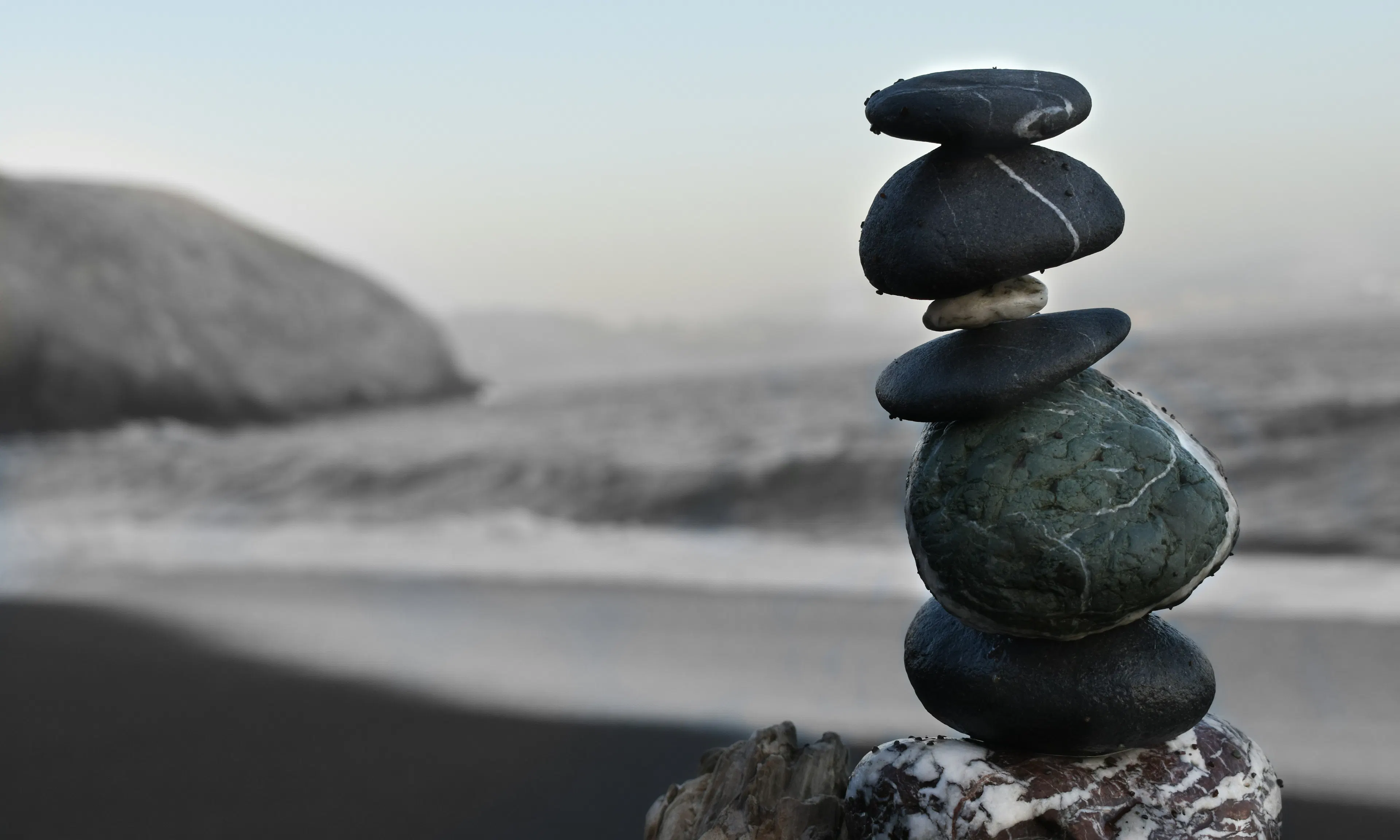 a stack of rocks balanced in a tower