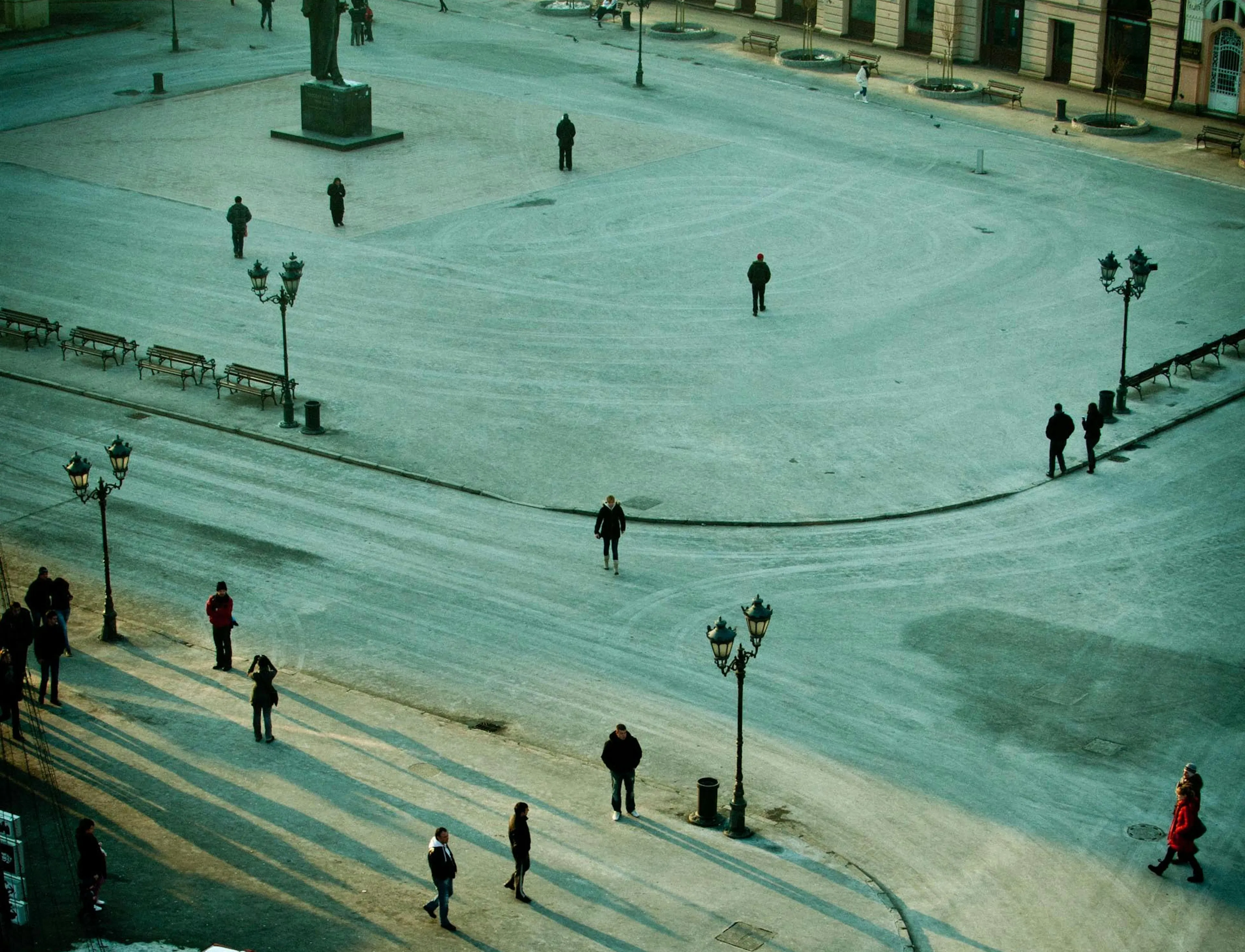 zoomed out view of people in a square