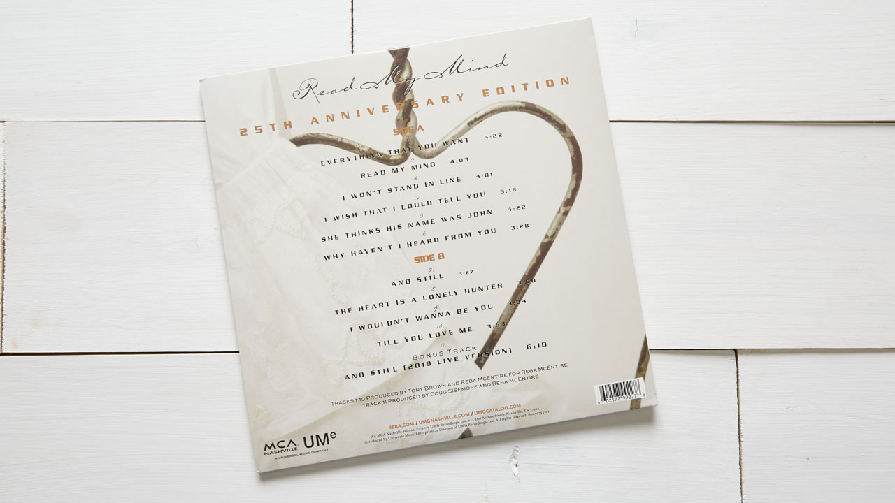 The back of Reba's Reba's 25th anniversary edition "Read my Mind" vinyl record.