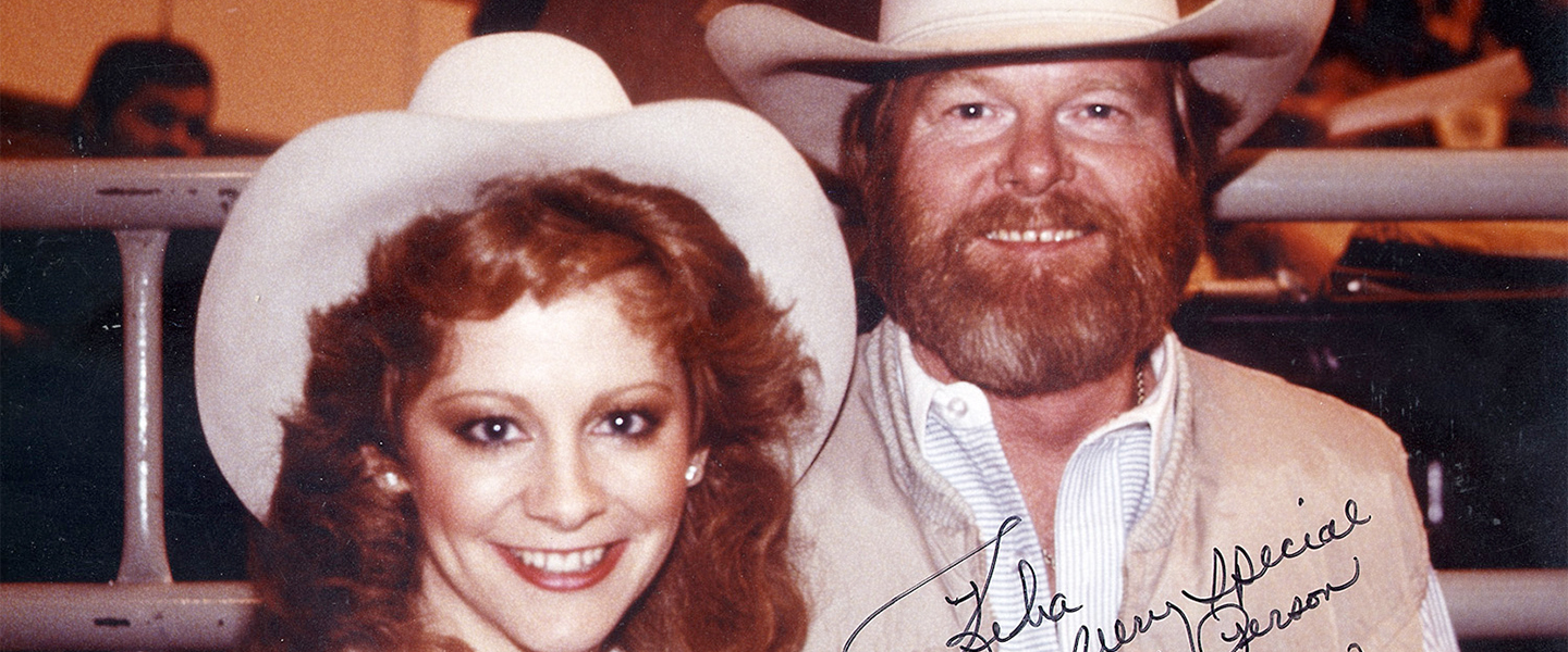 A picture of Reba McEntire and Red Steagall.