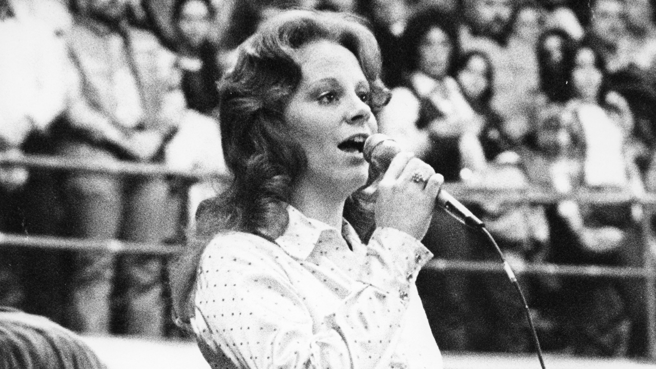 Reba McEntire singing during the 1978 National Finals Rodeo.