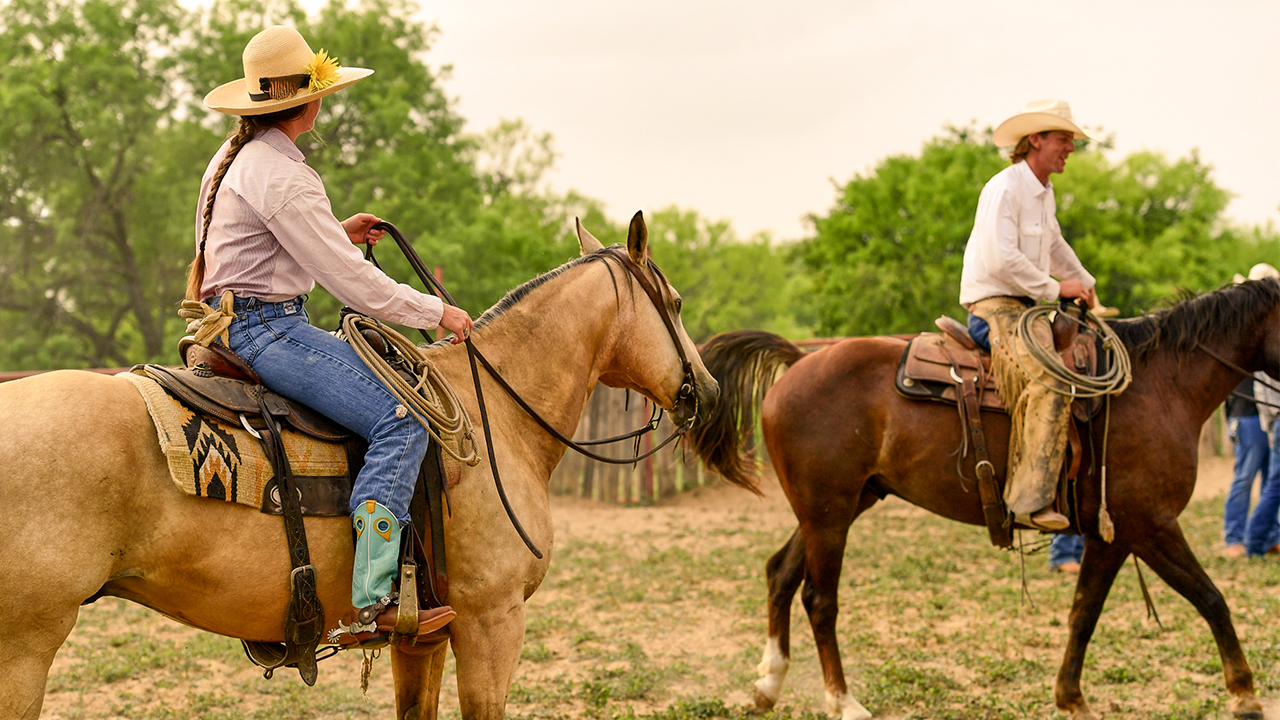 People riding horses.