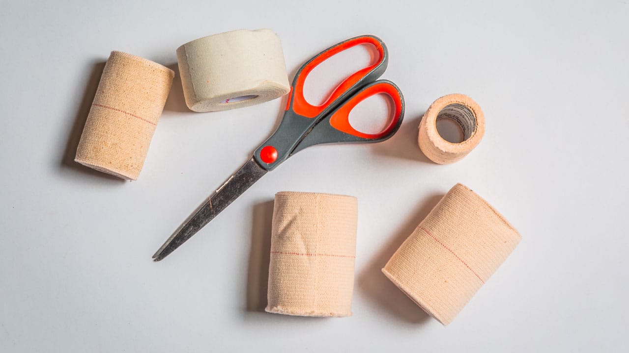 Medical wraps, tape & scissors.