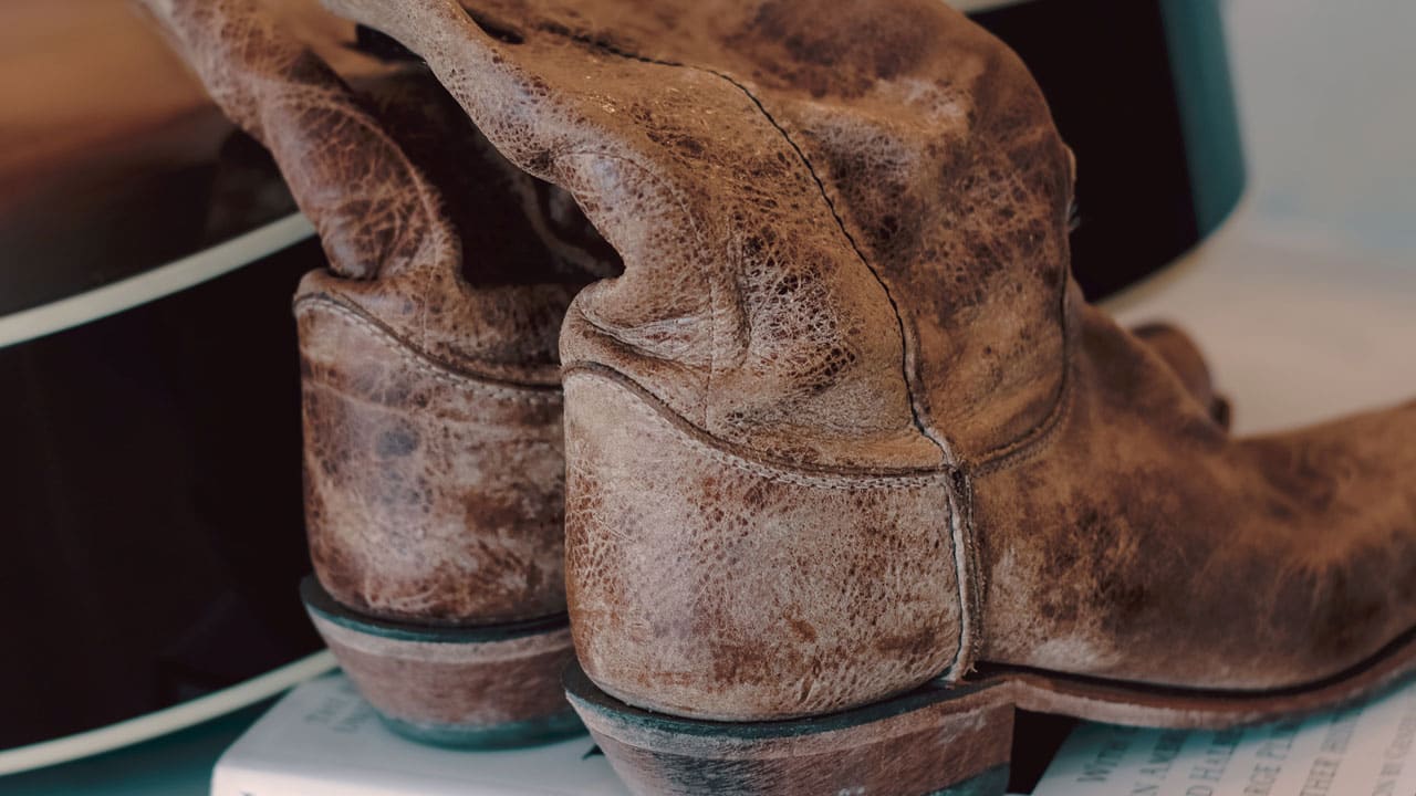 Luke Pells distressed Justin Boots heel