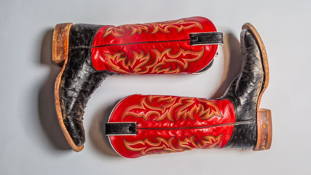 Justin Pascoe black and red full quill boots.