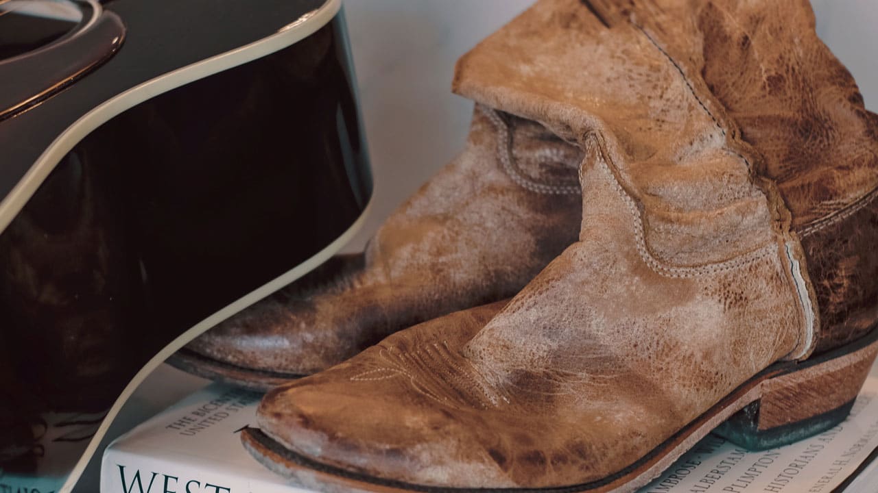 Luke Pells distressed Justin Boots detail