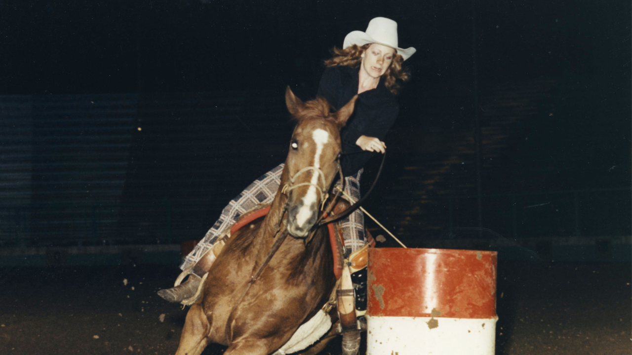 Reba barrel racing in 1975.