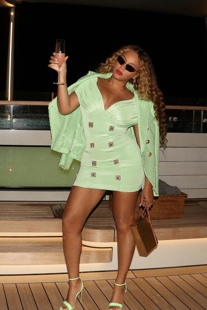 Beyonce wearing sunglasses on a boat
