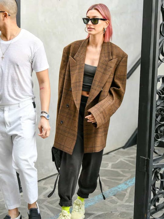 Hailey Bieber wearing the Ray-Ban Original Wayfarer RB2140 sunglasses