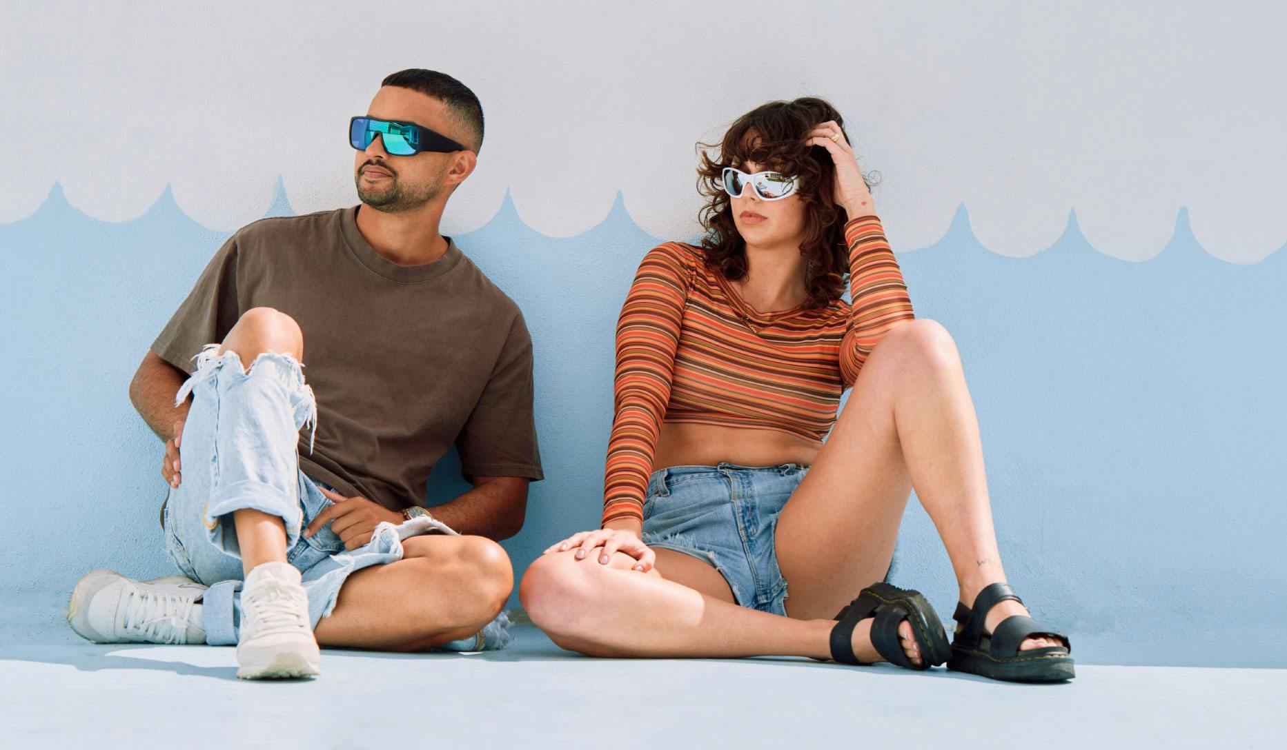 Man and Woman wearing polarised sunglasses