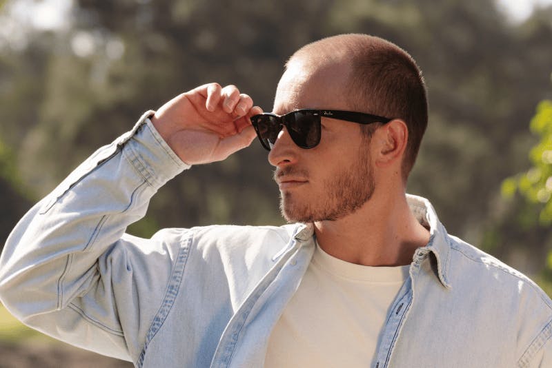 Man wearing polarised sunglasses