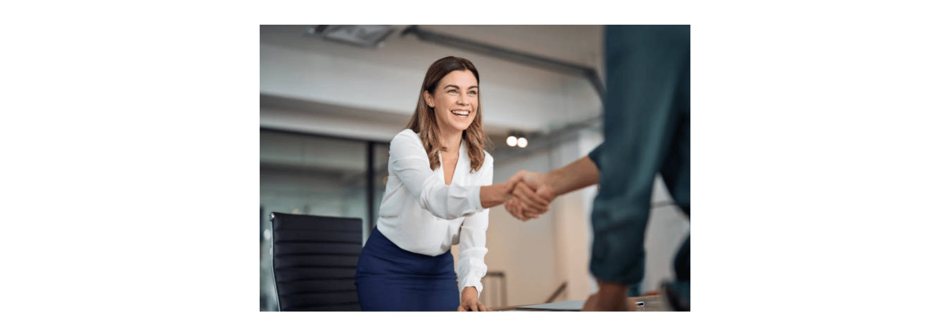 corporate woman giving handshake