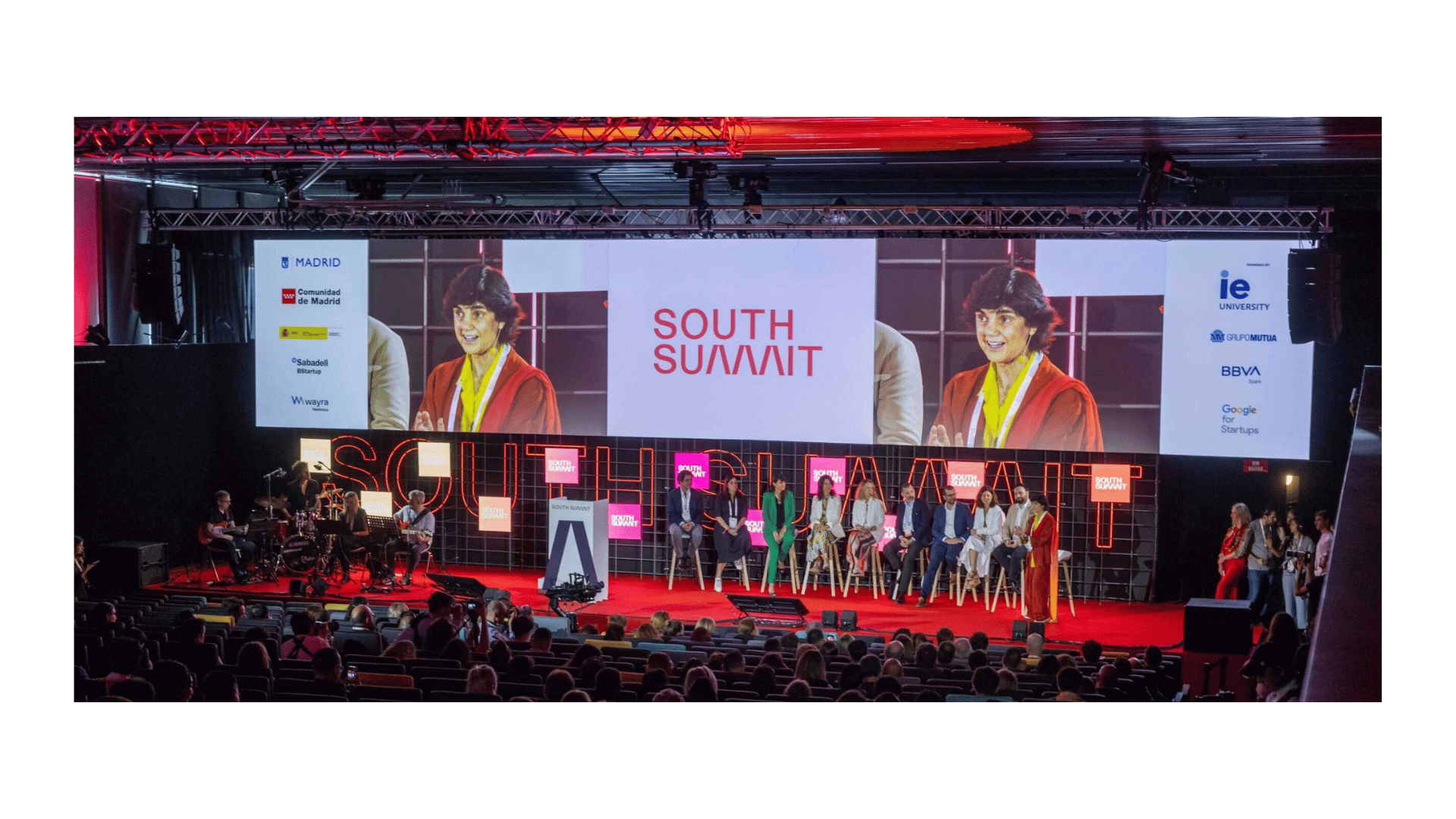  La Nave venue in Madrid during South Summit — busy exhibition floor with startups and investors