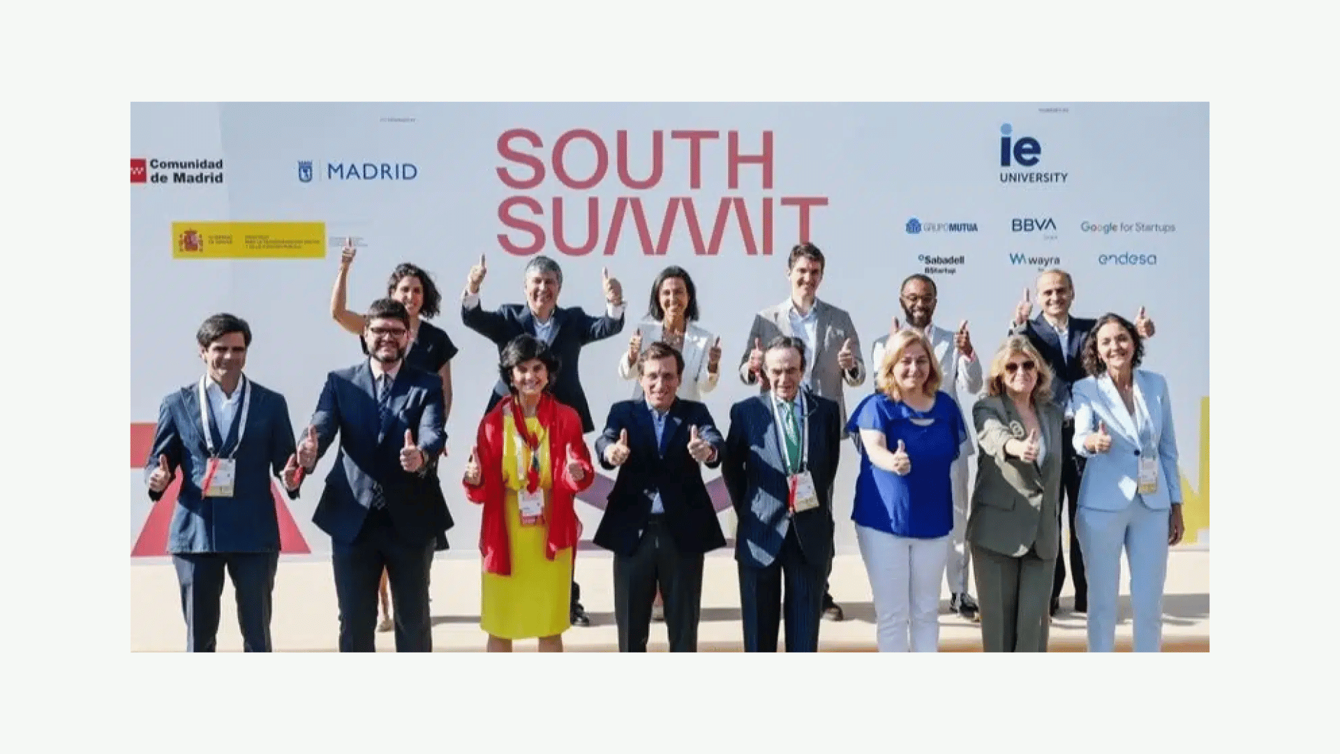 Diverse group of startup founders networking at an innovation conference in Spain