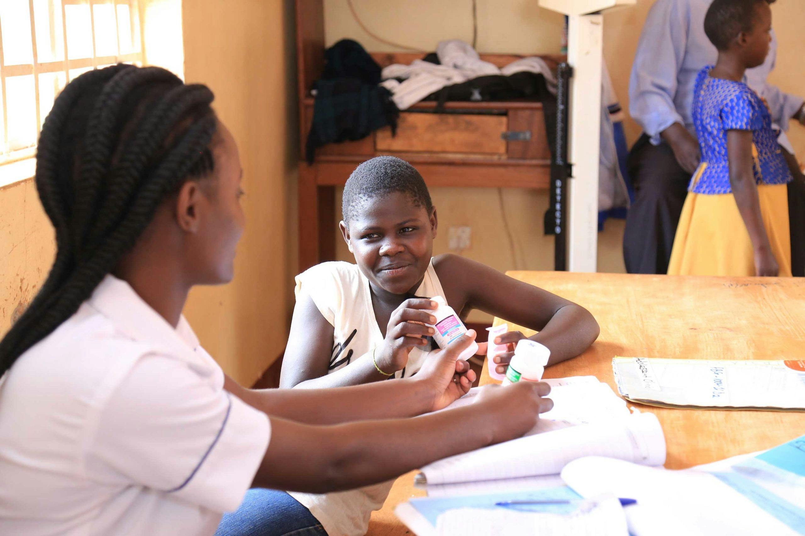 Nurse attending to child at St. Francis health care services
