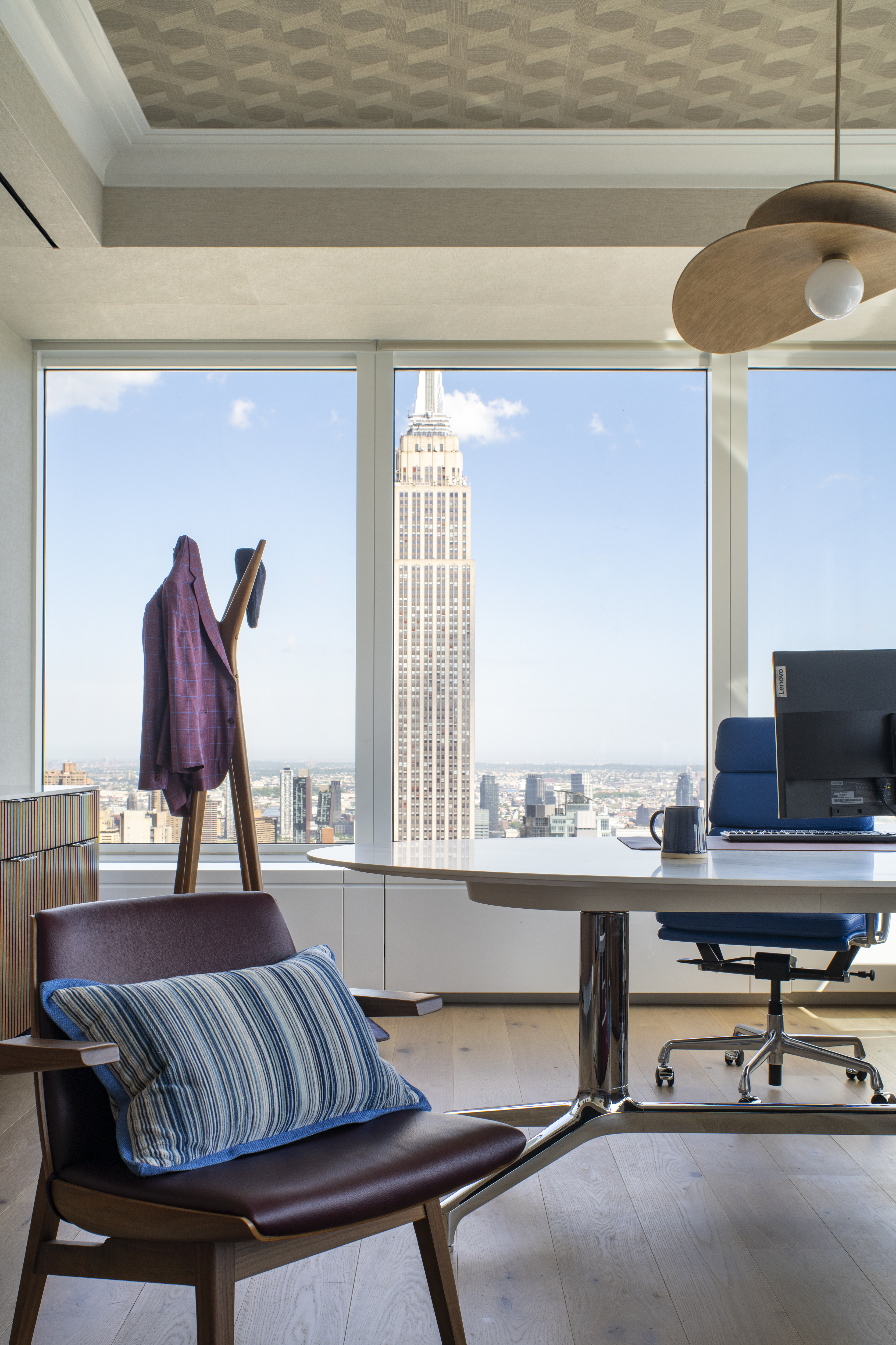 Luxury executive office at One Penn Plaza designed by K.A. Murphy Interiors with custom furniture, panoramic Manhattan views, and refined contemporary finishes.