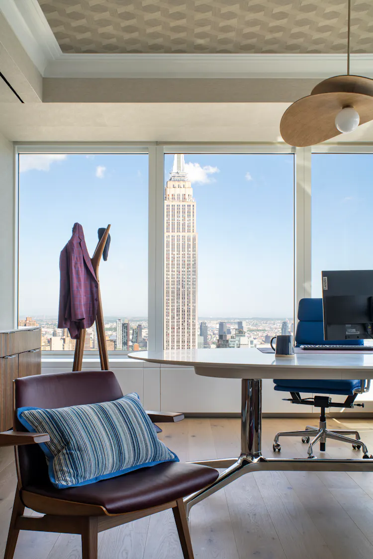Luxury executive office at One Penn Plaza designed by K.A. Murphy Interiors with custom furniture, panoramic Manhattan views, and refined contemporary finishes.