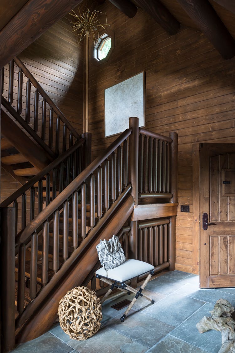 Hudson Valley log cabin retreat Kitchen with rustic luxury interior by K.A. Murphy Interiors