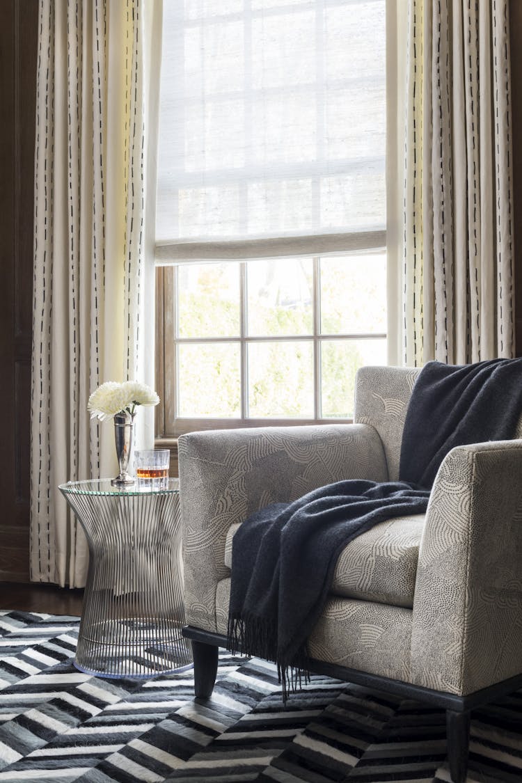 Contemporary chair with clean lines in a Manhattan study, designed by K.A. Murphy Interiors