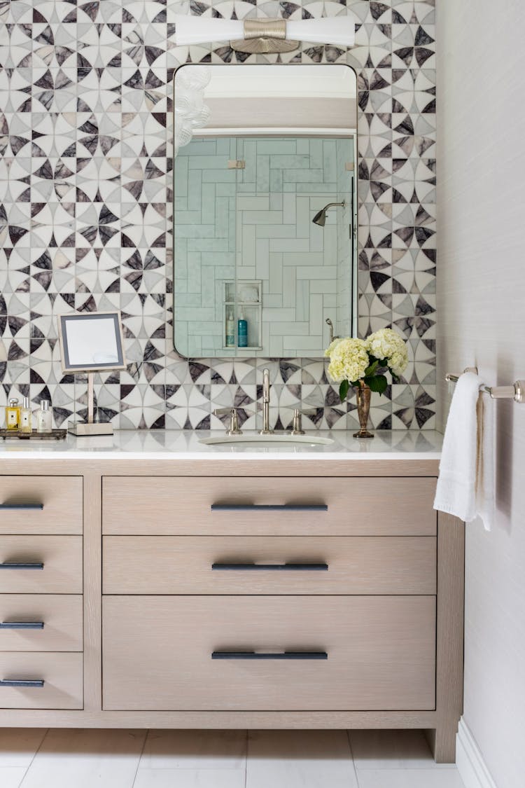 Close-up of custom vanity detailing in a Long Island spa bathroom, highlighting craftsmanship and design, by K.A. Murphy Interiors