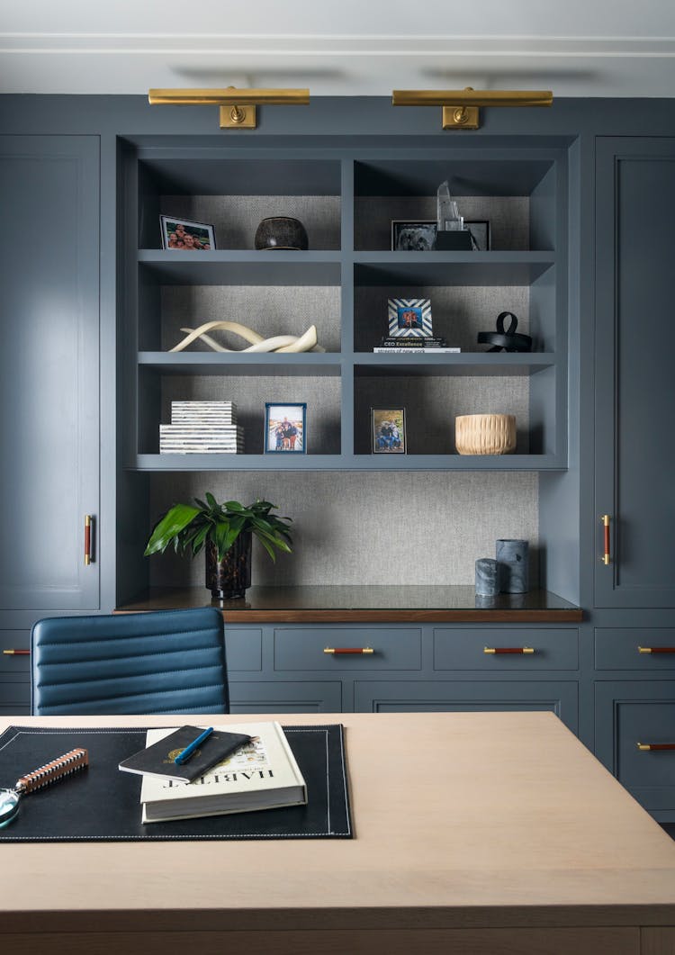 Custom built-in shelving and desk in a Long Island family home office, designed by K.A. Murphy Interiors