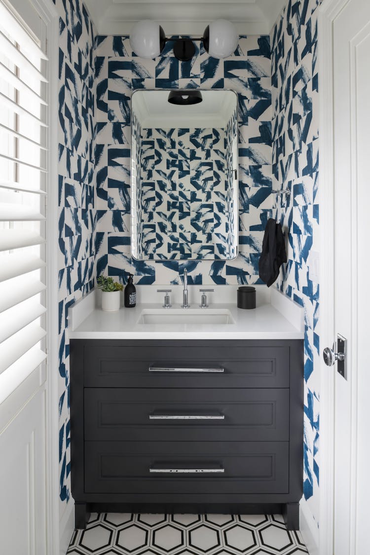 Contemporary vinyl art installation adding character to a Long Island family home, designed by K.A. Murphy Interiors